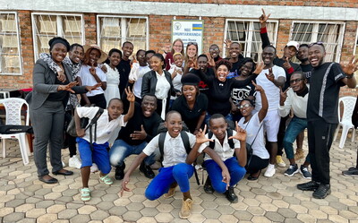 Lilly Frields with students and teachers in Rwanda during a study abroad trip. 