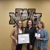NWU Honors Academy Staff receives reaccreditation award. L to R: Andrea Howell - staff assistant, Heather Aruba - WHA director and Krista Cox - assistant director. 