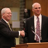 NWU President Fred Ohles and SCC President Paul Illich.