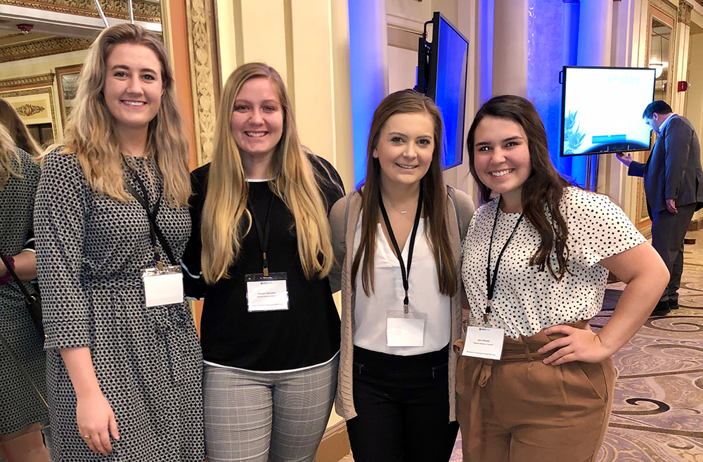 Four students at a psychology conference.