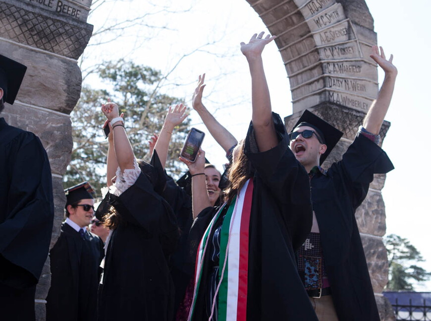 The Class of 2018 continued the annual tradition of taking its Final Walk through campus, which concludes with a pass through the campus arch.