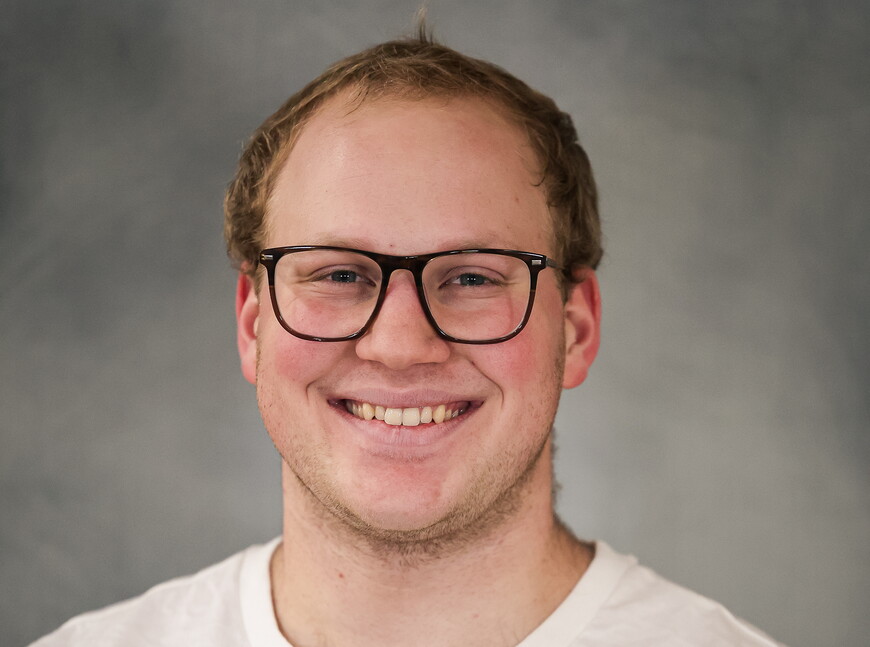 A headshot of Colin Wojtkiewicz.