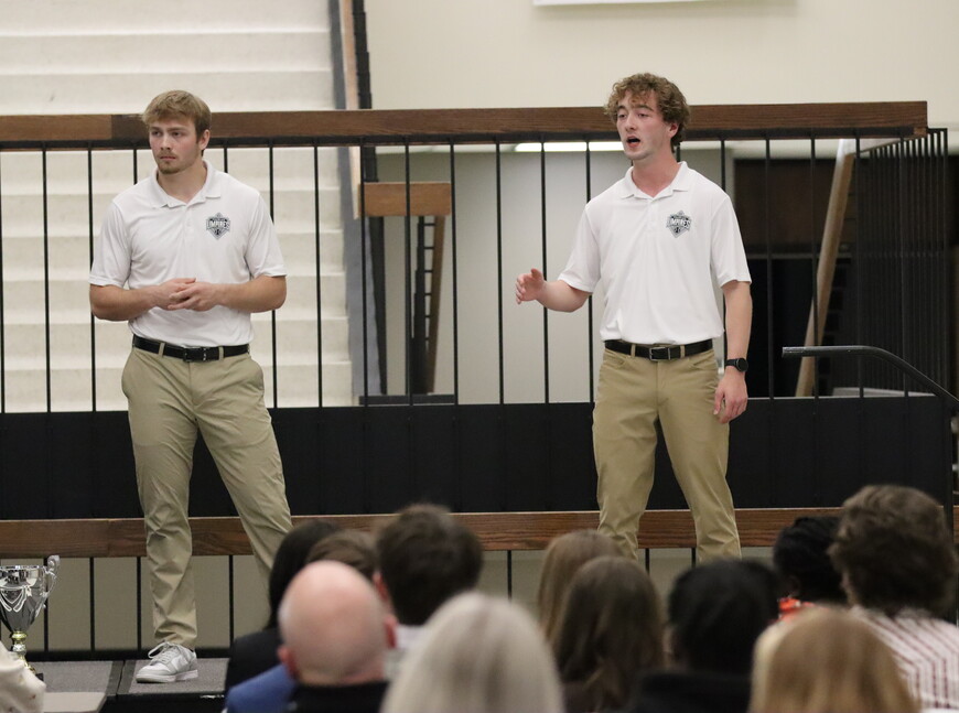 Kelby Zimmerman and Maddox Lambert present at the NWU Pitch Contest finals.