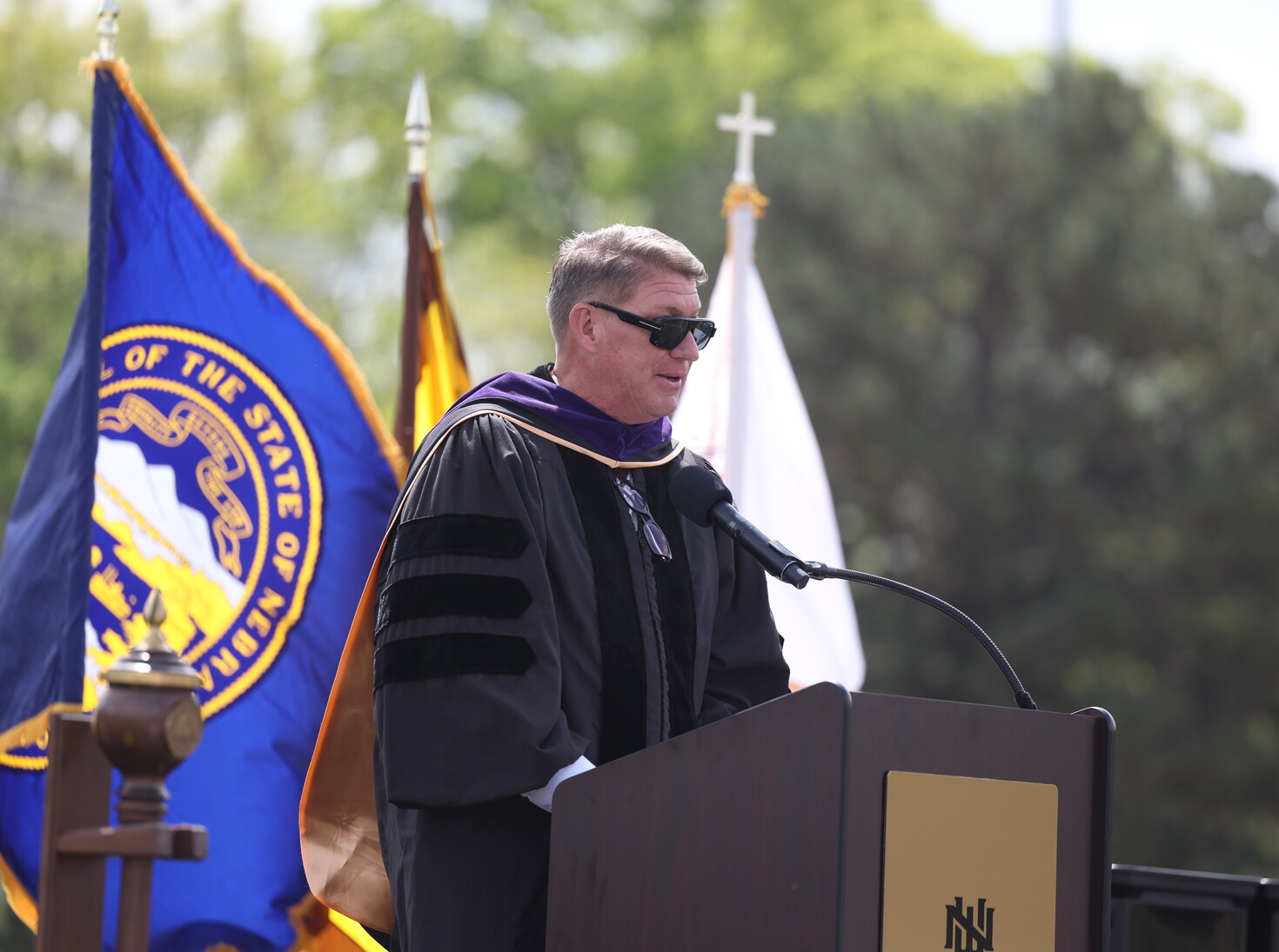 Jason Licht speaks at NWU's 2026 commencement ceremony.