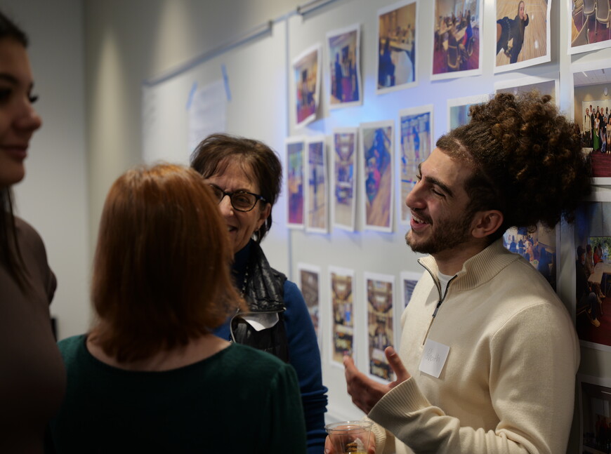 Ghaith Taha laughs during last fall's Give to Learn event.