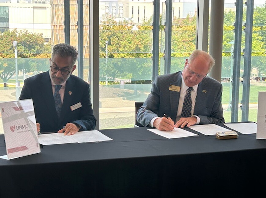 Ali Khan, Dean, UNMC College of Public Health, and Darrin Good, NWU President.