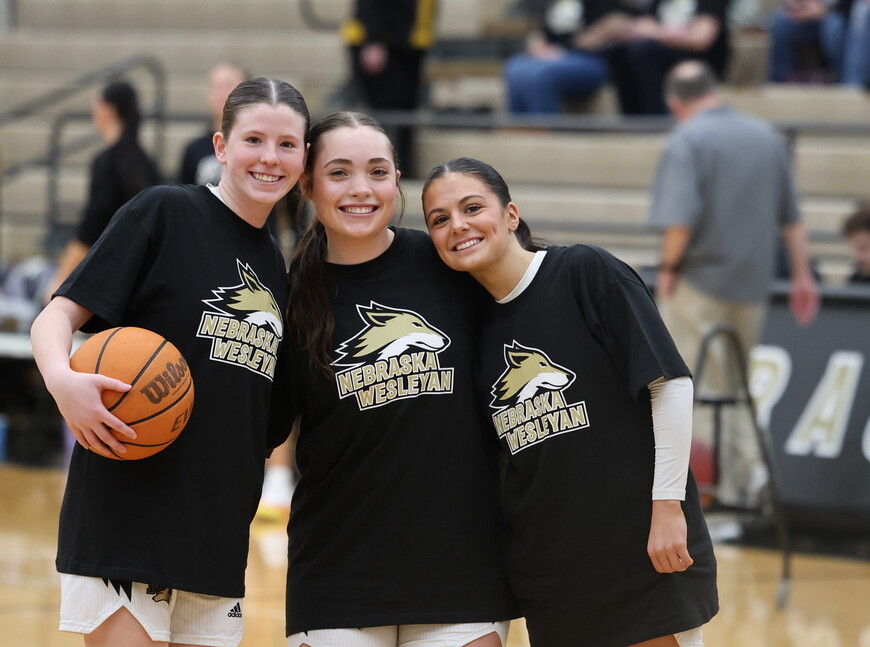 Three women with a basketball