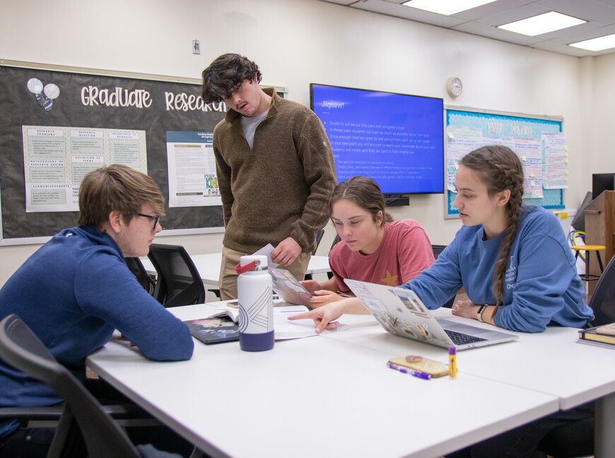 Four students at a table