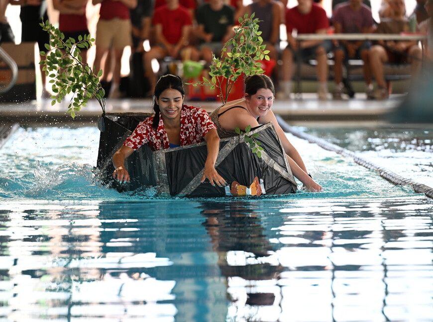 Students competing in a boat race