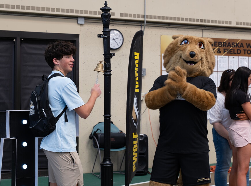 Student ringing bell