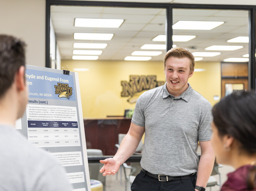 Student presenting at symposium