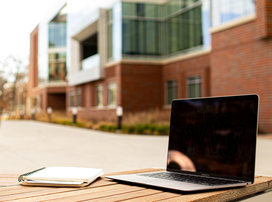 Computer on an outside table.