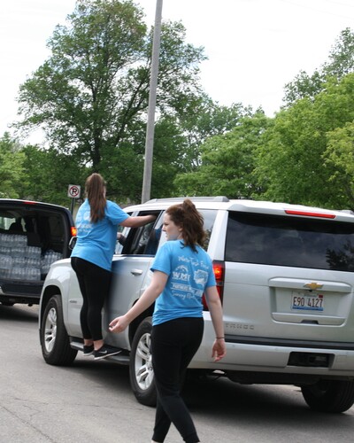 Sophomores Michaela Wells and Laurel Withee traveled to Flint, Michigan, to distribute 15,000 bottles of water over two days last summer. 