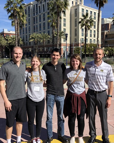 NWU math students and Dr. Austin Mohr (center) traveled to San Diego, Calif. where students listened to and presented research at the Joint Mathematics Meeting, which is the world's largest math conference.