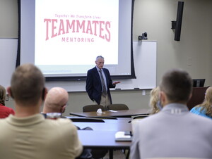 Tom Osborne speaking to staff