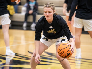 Tessa Hurlburt is a double major competing in two sports at NWU.