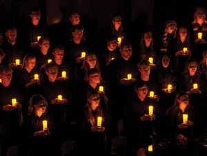 NWU Choir with candles during Christmas with Wesleyan. 
