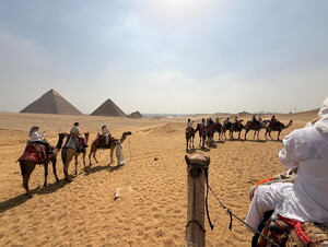 NWU students riding camels in Egypt.
