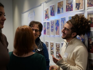 Ghaith Taha laughs during last fall's Give to Learn event.