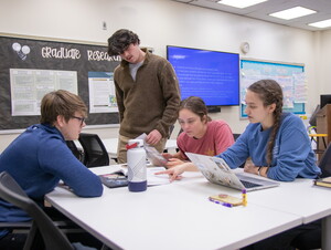 Four students at a table