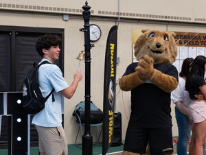 Student ringing bell