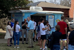 Students and employees gather for a sweet treat from Tropical Sno