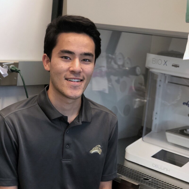 Anthony Baker, psychology student, in a lab doing research.