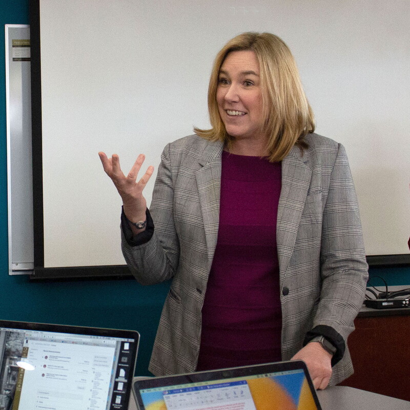 Melissa Hayes in the Cooper Center speaking in front of students.