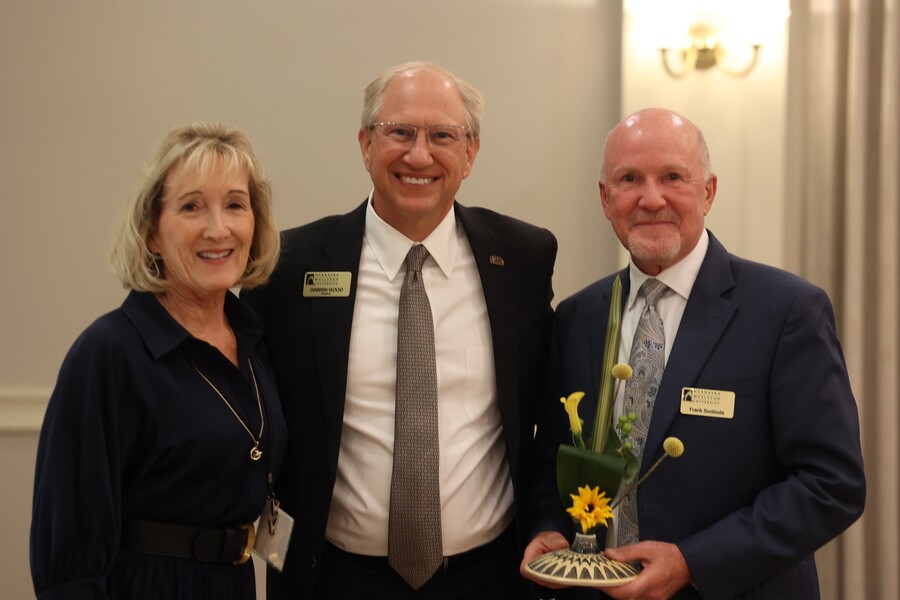 President Good presenting award.