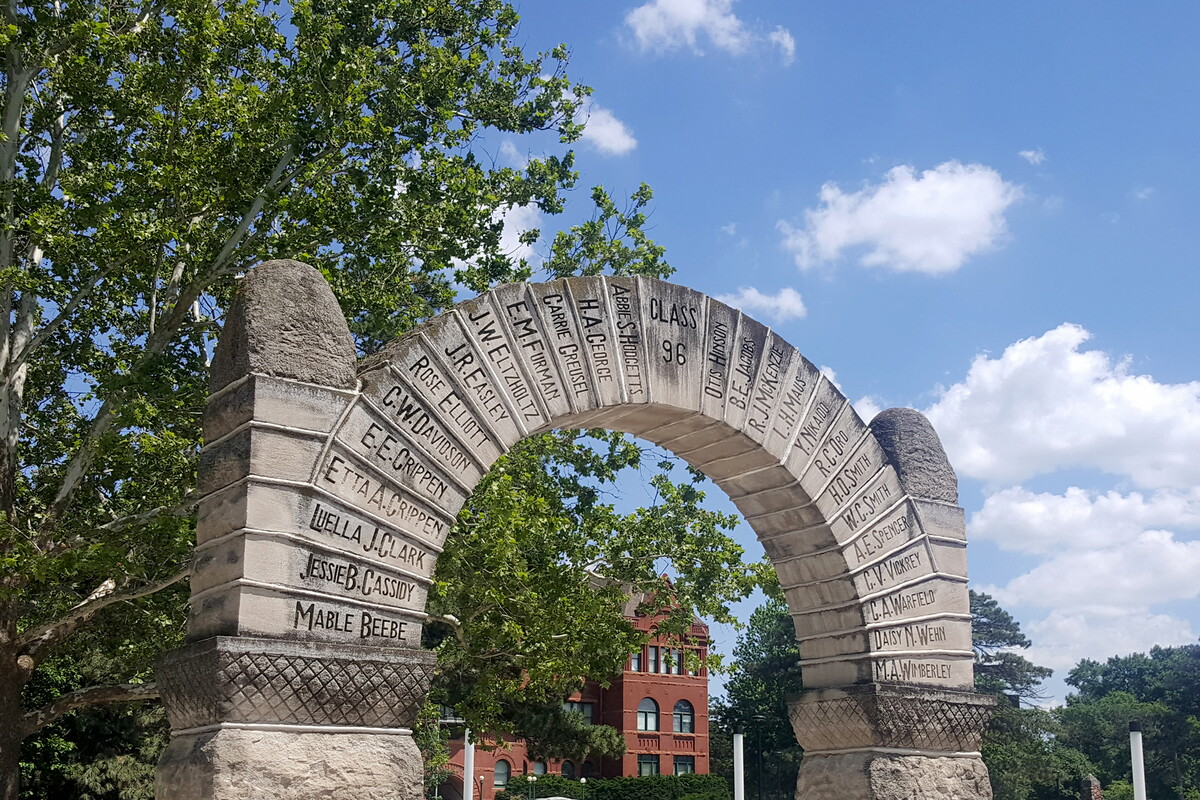 Old Main in the background of Nebraska Wesleyan's historic arch.