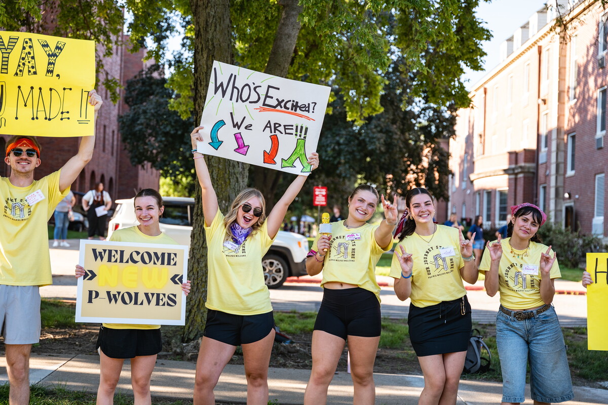 Students cheering on new students