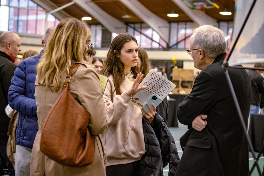 Prospective students talking to a professor