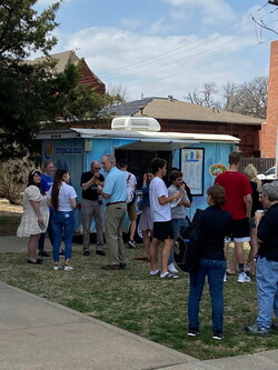 Students and employees gather for a sweet treat from Tropical Sno