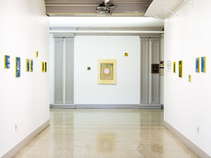 Art work hangs in The Archive.