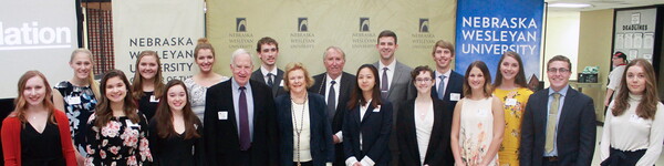 Group of students with Harry and Reba Huge, the sponsors of the Huge scholarship.
