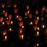 NWU Choir with candles during Christmas with Wesleyan. 