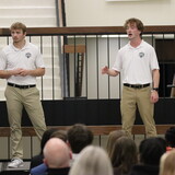 Kelby Zimmerman and Maddox Lambert present at the NWU Pitch Contest finals.
