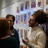 Ghaith Taha laughs during last fall's Give to Learn event.