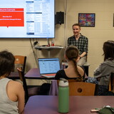NWU alumnus Eoghan Hartley talks about his experience as a stage manager at Radio City Music Hall. Among the students listening is Samantha Wellenbring, who is stage managing Pinewood Bowl's production of Annie this summer.
