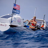 Taryn Smith rows her boat in the Atlantic Ocean.