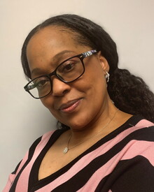 Headshot of Ambe’ Dowdell White