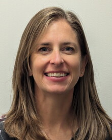 Headshot of Evi Wusk